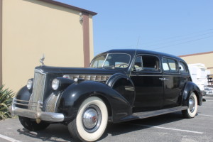 1940 Packard 180 divider window limousine. 7 Passenger. Back among the living, running and driving after sleeping in the garage since 1989.  CLICK THE PHOTO FOR MORE DETAILS.  $17,500